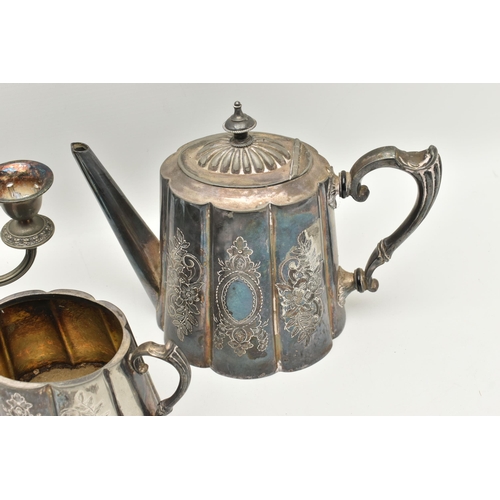 555 - AN ASSORTMENT OF WHITE METAL, to include a three piece tea set with floral detail, together with a t... 