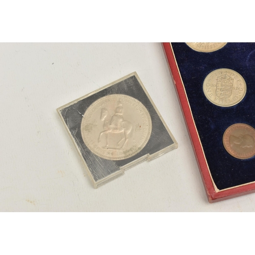 562 - A CASED SET OF COINS, TOGETHER WITH A COMMEMORATIVE COIN, a cased set of nine coins, together with a... 