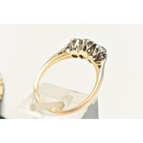 569 - A YELLOW METAL THREE STONE DIAMOND RING, set with three old cut diamonds, estimated total diamond we... 