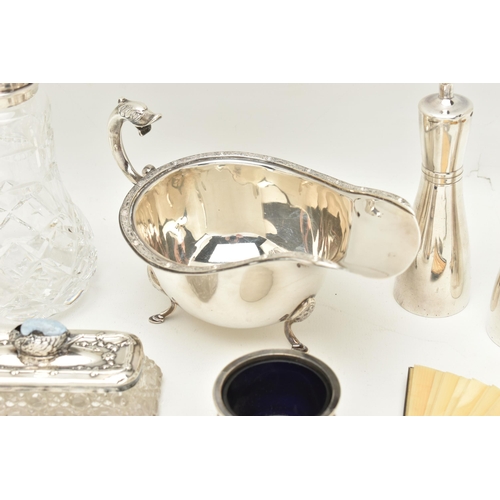 576 - A SELECTION OF SILVER AND WHITE METAL WARE, to include a 'Deakin & Francis' silver gravy boat, polis... 