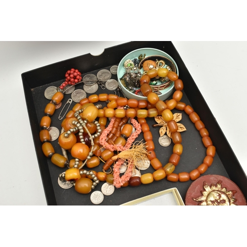 578 - A SMALL ASSORTMENT OF ITEMS, to include three orange Bakelite bead necklaces, one orange plastic bea... 