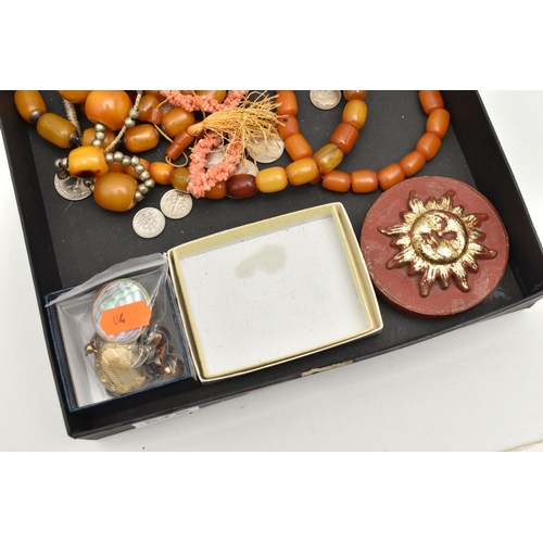 578 - A SMALL ASSORTMENT OF ITEMS, to include three orange Bakelite bead necklaces, one orange plastic bea... 