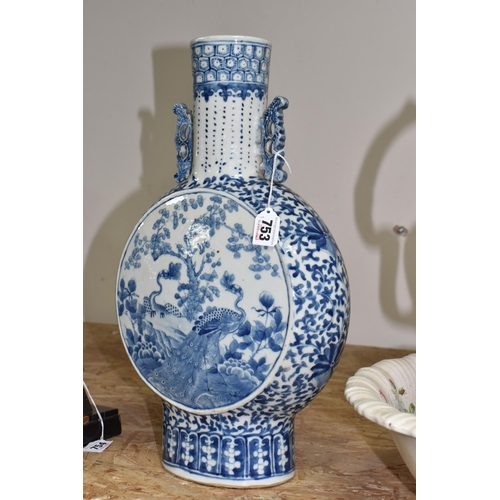 753 - A CHINESE MOON FLASK AND A WASH JUG WITH A BASIN to include a blue and white Chinese moon flask with... 