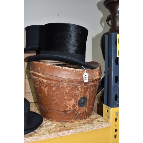 765 - A GROUP OF EARLY 20TH CENTURY TOP HATS, comprising  a Lincoln-Bennett & Co Burlington Gardens, Old B... 