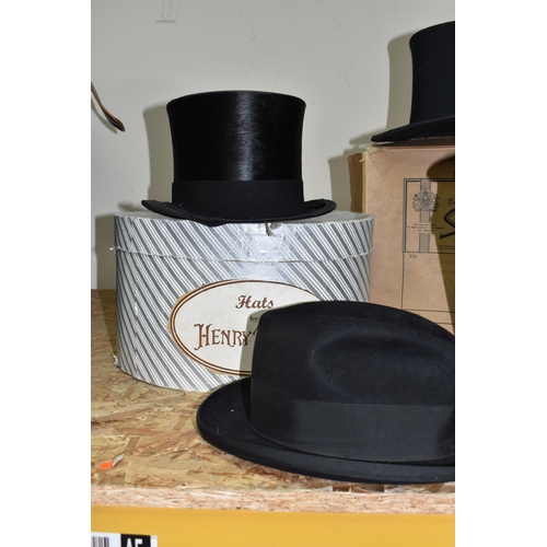 765 - A GROUP OF EARLY 20TH CENTURY TOP HATS, comprising  a Lincoln-Bennett & Co Burlington Gardens, Old B... 