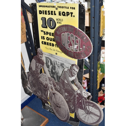 778 - A VINTAGE MOTORCYCLE SUIT AND ADVERTISING STAND comprising a vintage cardboard 'Intl. Diesel & Co.' ... 