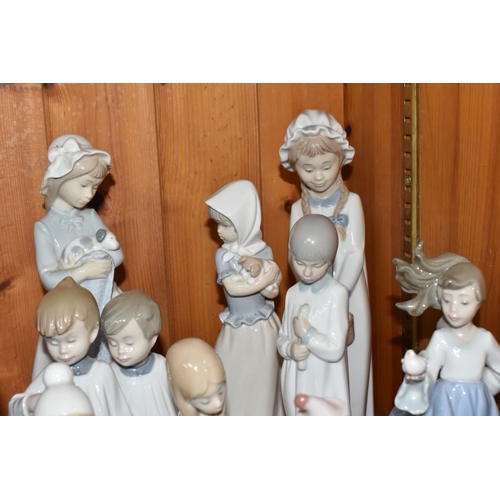 779 - A GROUP OF FIGURES BY GOEBEL HUMMEL, LLADRO AND NA0, comprising of, W. Goebel Hummel Max & Moritz 12... 