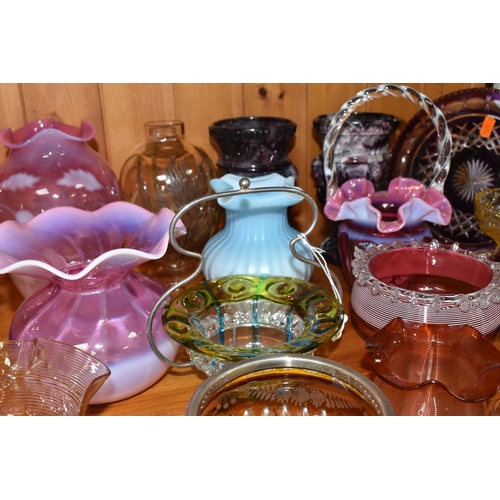 780 - A GROUP OF DECORATIVE COLOURED GLASS ITEMS, comprising of a cranberry opalescent hand painted floral... 