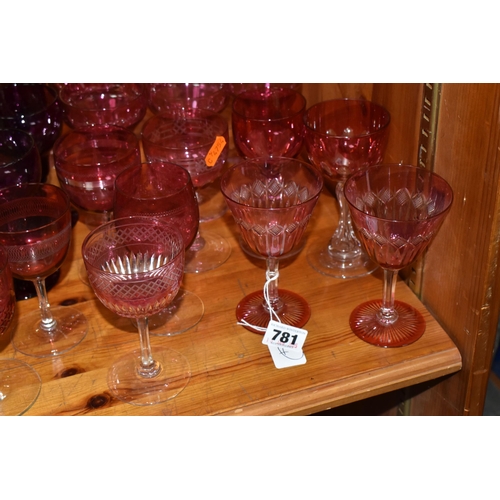 781 - A GROUP OF VARIOUS VINTAGE COLOURED DRINKING GLASSES, comprising two cut to clear tall wine glasses ... 