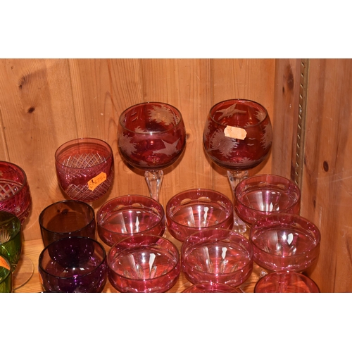 781 - A GROUP OF VARIOUS VINTAGE COLOURED DRINKING GLASSES, comprising two cut to clear tall wine glasses ... 