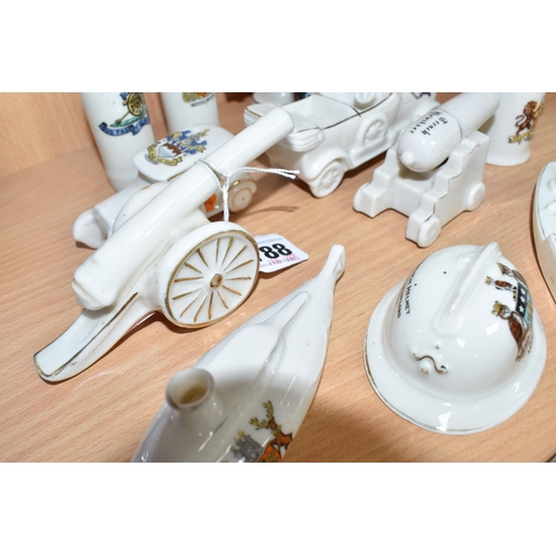 788 - A COLLECTION OF MILITARY THEMED CRESTED WARE, thirteen pieces in the forms of cannons, a battleship,... 