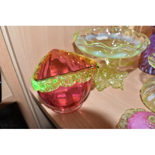 810 - A COLLECTION OF URANIUM GLASS WARES, to include a cranberry and white textured vase with partially c... 