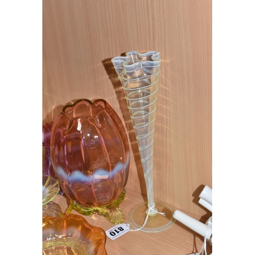 810 - A COLLECTION OF URANIUM GLASS WARES, to include a cranberry and white textured vase with partially c... 