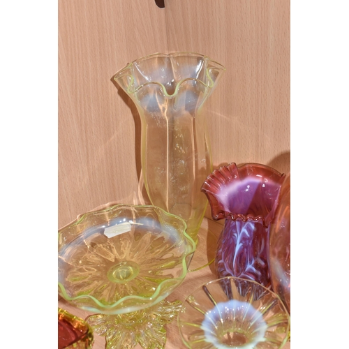 810 - A COLLECTION OF URANIUM GLASS WARES, to include a cranberry and white textured vase with partially c... 