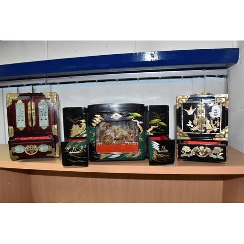 818 - THREE ORIENTAL JEWELLERY BOXES, comprising a Japanese painted black lacquer musical rickshaw example... 