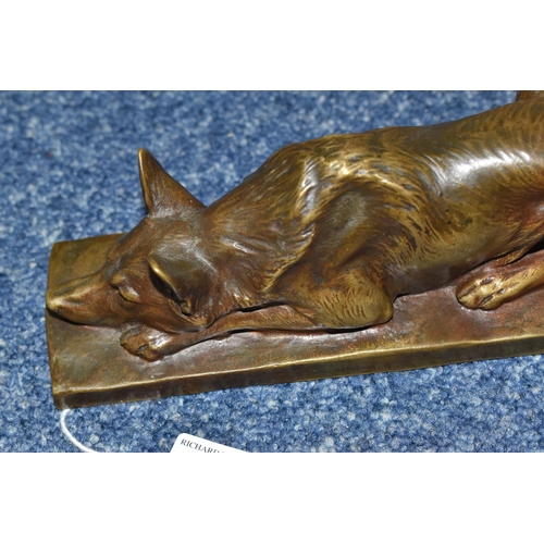 828 - AFTER LOUIS RICHÉ A BRONZED FIGURE OF A RECUMBENT GERMAN SHEPHERD DOG, on a rectangular base, signed... 