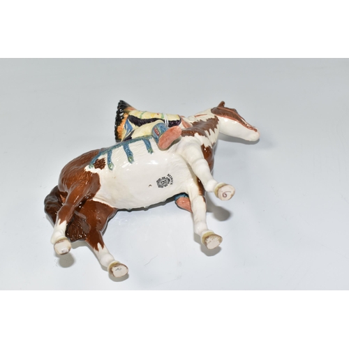 832 - A BESWICK MOUNTED INDIAN ON SKEWBALD HORSE model 1391, introduced 1955 and retired in 1990, designed... 