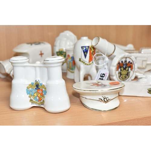 836 - A GROUP OF MILITARY THEMED CRESTED WARE comprising a battleship, zeppelin, a tank, a grenade, a cann... 