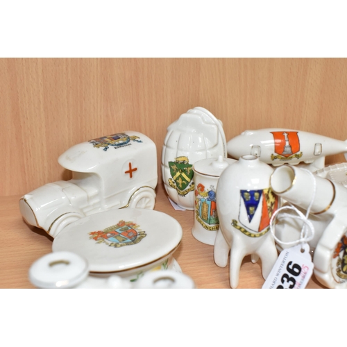 836 - A GROUP OF MILITARY THEMED CRESTED WARE comprising a battleship, zeppelin, a tank, a grenade, a cann... 