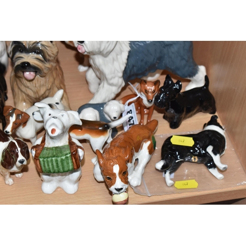 847 - A COLLECTION OF BESWICK CATS AND DOGS to include sixteen dog sculptures to include a Border Collie '... 