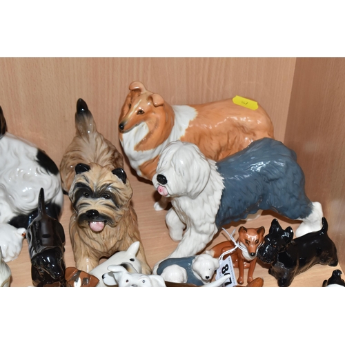 847 - A COLLECTION OF BESWICK CATS AND DOGS to include sixteen dog sculptures to include a Border Collie '... 