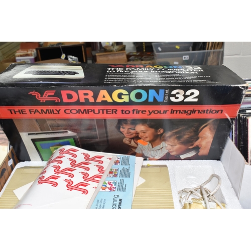 885 - A DRAGON 32 COMPUTER WITH THE BOX AND GAMES, games include Cave Hunter, Starship Chameleon, Space Wa... 