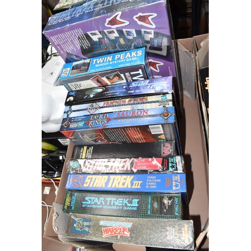 891 - TWO BOXES OF VINTAGE GAMES to include a quantity of Games Workshop published games comprising four J... 