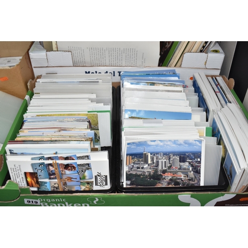 919 - SEVEN BOXES AND LOOSE AFRICAN RELATED EPHEMERA to include a vast amount of modern Postcards, Photoca... 