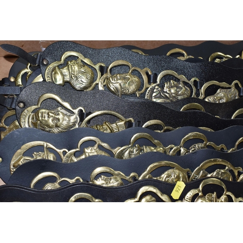 921 - ONE BOX OF VINTAGE BRASS HORSE MEDALLIONS ON LEATHER STRAPS, to include ten leather straps all with ... 