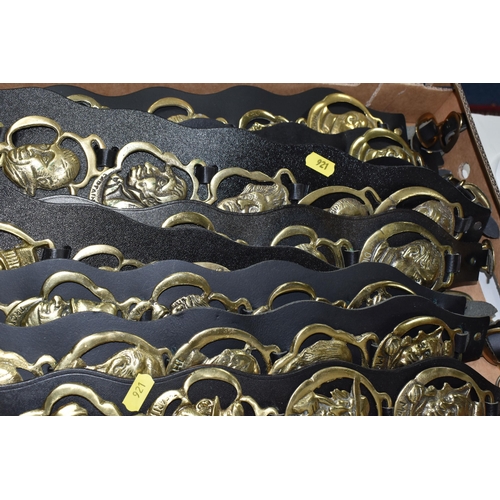 921 - ONE BOX OF VINTAGE BRASS HORSE MEDALLIONS ON LEATHER STRAPS, to include ten leather straps all with ... 