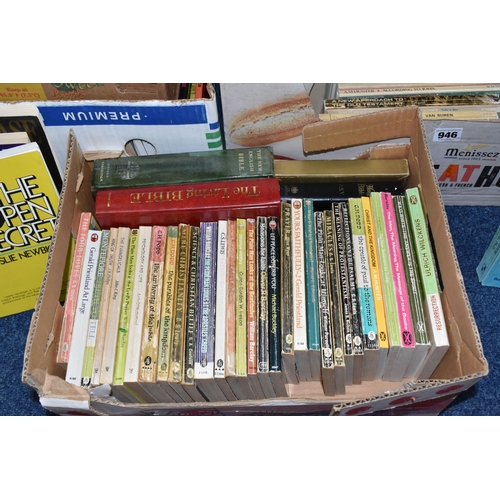 946 - TEN BOXES OF BOOKS ON RELIGION containing several hundred titles in hardback and paperback formats, ... 