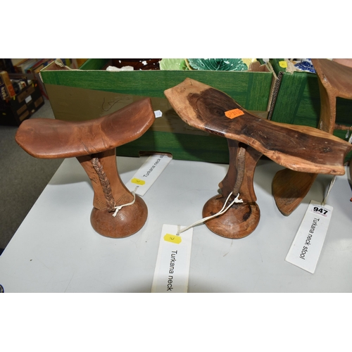 947 - A GROUP OF THREE TURKANA (NORTH WEST KENYAN TRIBE) NECK STOOLS comprising a double-legged, engraved ... 