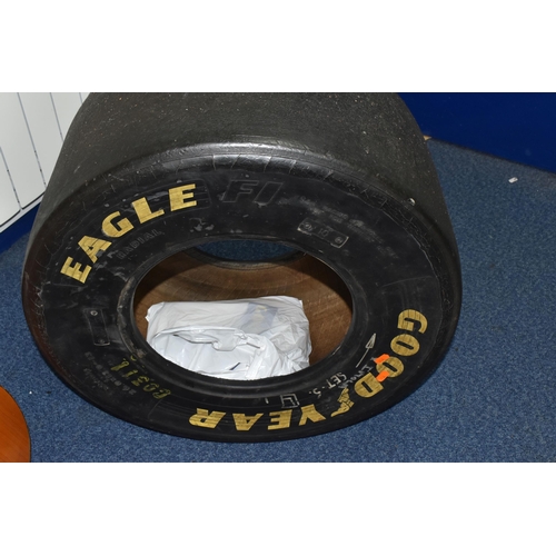 956 - A GOODYEAR EAGLE F1 TYRE, size 26x13, of radial construction, marked for racing purposes only, annot... 