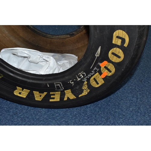 956 - A GOODYEAR EAGLE F1 TYRE, size 26x13, of radial construction, marked for racing purposes only, annot... 