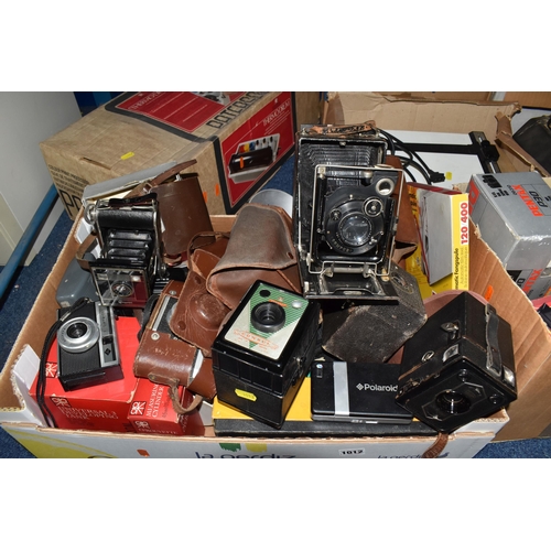 1012 - FIVE BOXES AND LOOSE CAMERAS AND PHOTOGRAPHIC EQUIPMENT, to include an Eiki LC colour video projecto... 