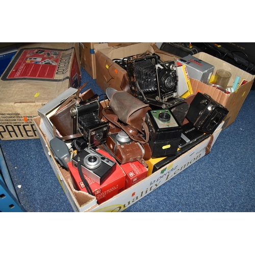 1012 - FIVE BOXES AND LOOSE CAMERAS AND PHOTOGRAPHIC EQUIPMENT, to include an Eiki LC colour video projecto... 