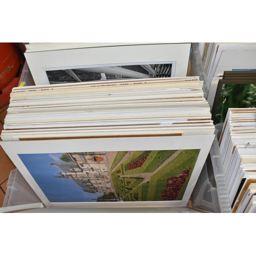 1021 - A QUANTITY OF MOUNTED PHOTOGRAPHIC PRINTS, most taken by renowned photographer David Keith Jones, co... 