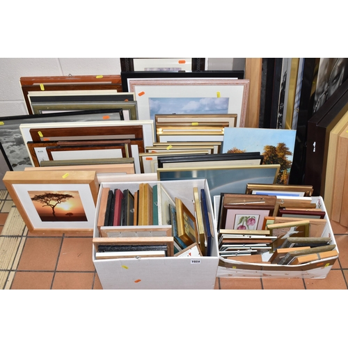 1024 - A QUANTITY OF FRAMED PRINTS AND PHOTOGRAPHS, the photographs are mostly African landscapes, African ... 