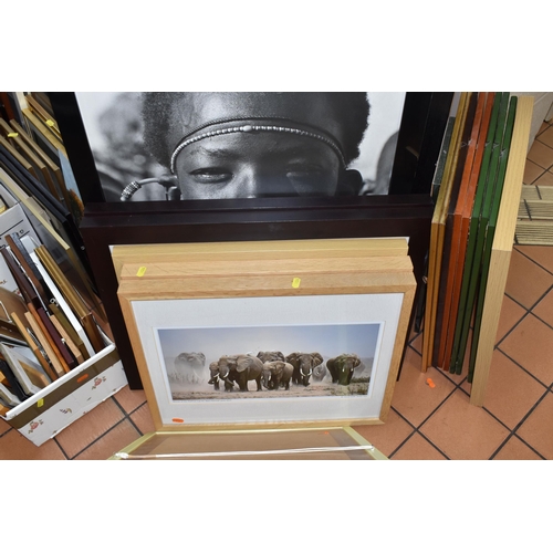 1024 - A QUANTITY OF FRAMED PRINTS AND PHOTOGRAPHS, the photographs are mostly African landscapes, African ... 