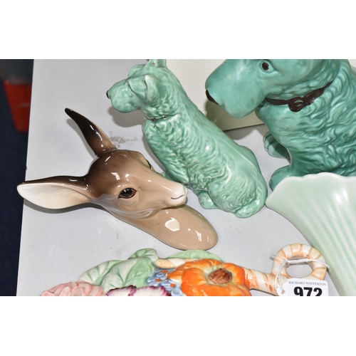 972 - A GROUP OF SYLVAC AND BESWICK ORNAMENTS AND WALL POCKETS, comprising a fireside green terrier 1209, ... 