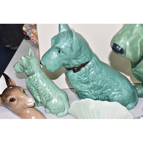 972 - A GROUP OF SYLVAC AND BESWICK ORNAMENTS AND WALL POCKETS, comprising a fireside green terrier 1209, ... 