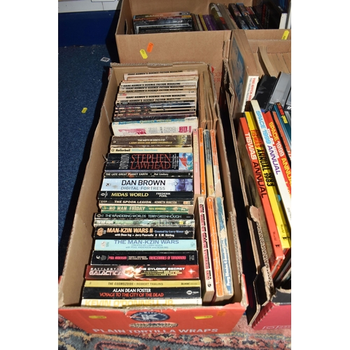 989 - FIVE BOXES OF BOOKS, MAPS, DVDS, VHS TAPES & MAGAZINES, the books are mostly in paperback format wit... 