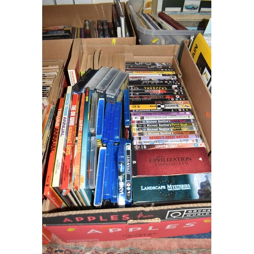 989 - FIVE BOXES OF BOOKS, MAPS, DVDS, VHS TAPES & MAGAZINES, the books are mostly in paperback format wit... 