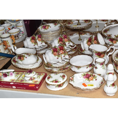 999 - A SIXTY PIECE ROYAL ALBERT 'OLD COUNTRY ROSES' DINNER SERVICE, and five pieces of giftware, comprisi... 