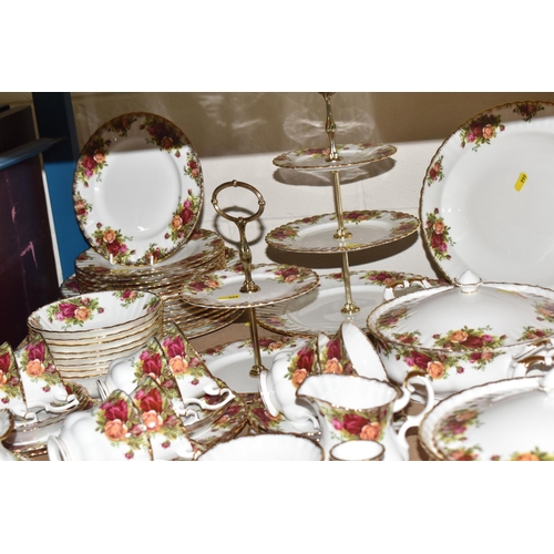 999 - A SIXTY PIECE ROYAL ALBERT 'OLD COUNTRY ROSES' DINNER SERVICE, and five pieces of giftware, comprisi... 