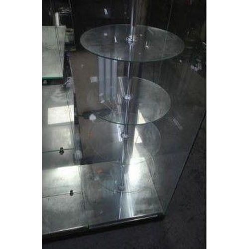 150 - A GLASS DISPLAY CABINET, with four shelves, and a five circular revolving shelves, width 91cm x dept... 