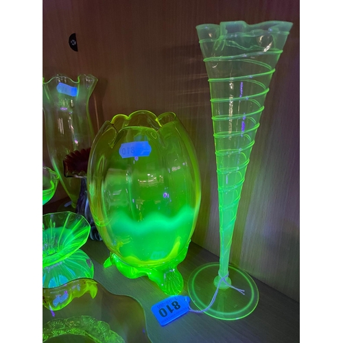 810 - A COLLECTION OF URANIUM GLASS WARES, to include a cranberry and white textured vase with partially c... 