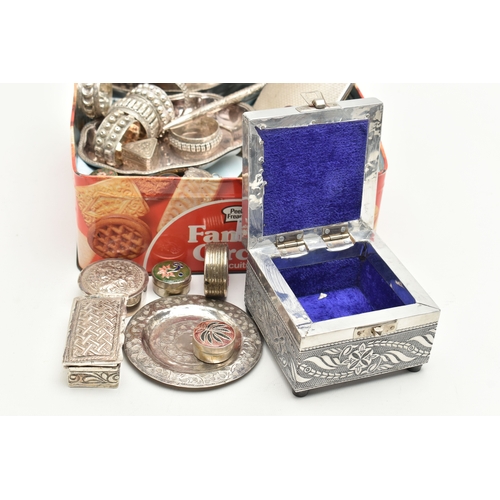 581 - A BOX OF ASSORTED WHITE METAL ITEMS, to include a cigarette case, an assortment of napkin rings, con... 