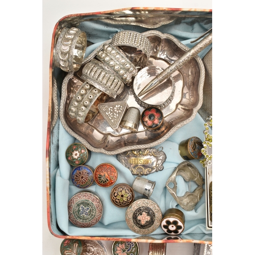 581 - A BOX OF ASSORTED WHITE METAL ITEMS, to include a cigarette case, an assortment of napkin rings, con... 