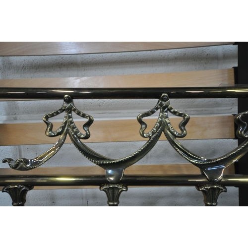 151 - THE ORIGINAL BEDSTEAD COMPANY, a brass Breamore 4ft6 bedstead, condition report: one leg missing bra... 